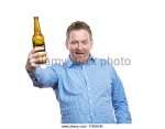 funny-young-drunk-man-holding-a-beer-bottle-studio-shot-on-white-background-f9gkhr.jpg