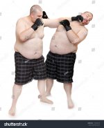 stock-photo-fighting-men-competition-concept-112653419.jpg
